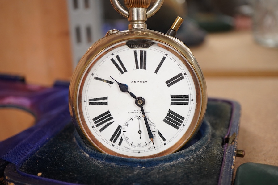 A leather travelling watch case, with nickel case goliath pocket watch, retailed by Asprey, with Roman dial and subsidiary seconds, case diameter 67mm.